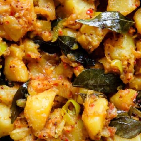 Sri Lankan spicy dry potato curry- a vegetarian, vegan curry with tempered onions, curry leaves and just enough chilli, a tasty dish to add to your rice and curry menu-islandsmile.org