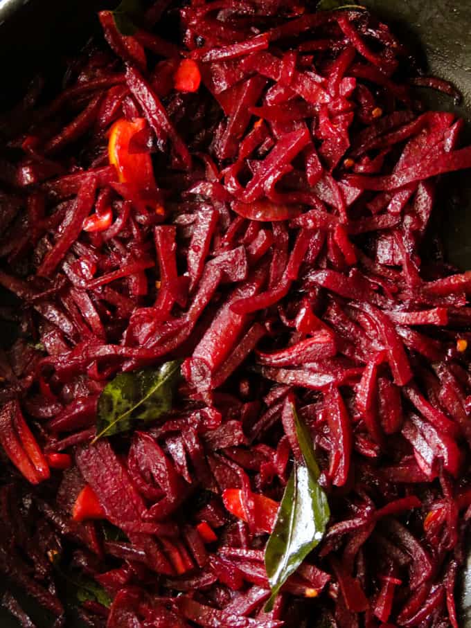 Easy Beetroot curry placed in a black bowl.