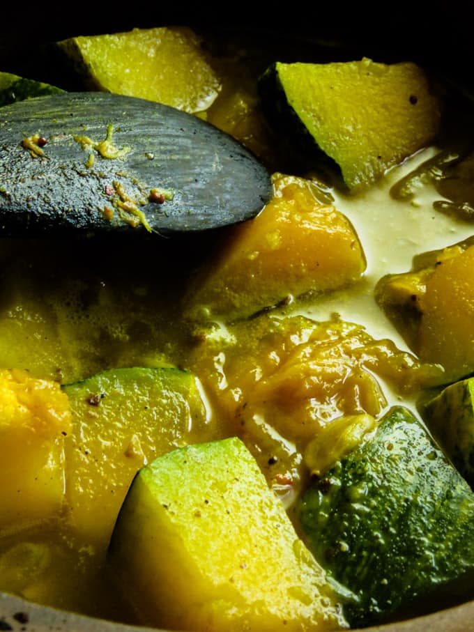 cook the pumpkin in spices and water to make the pumpkin curry.