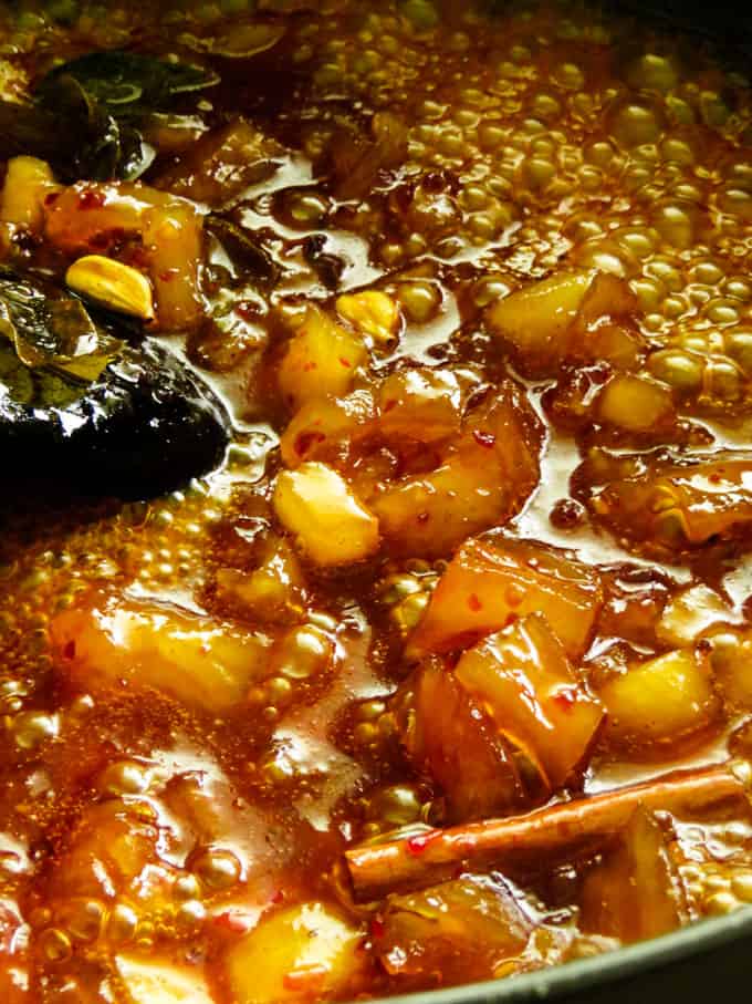 savory pineapple chutney bubbling in the pot.