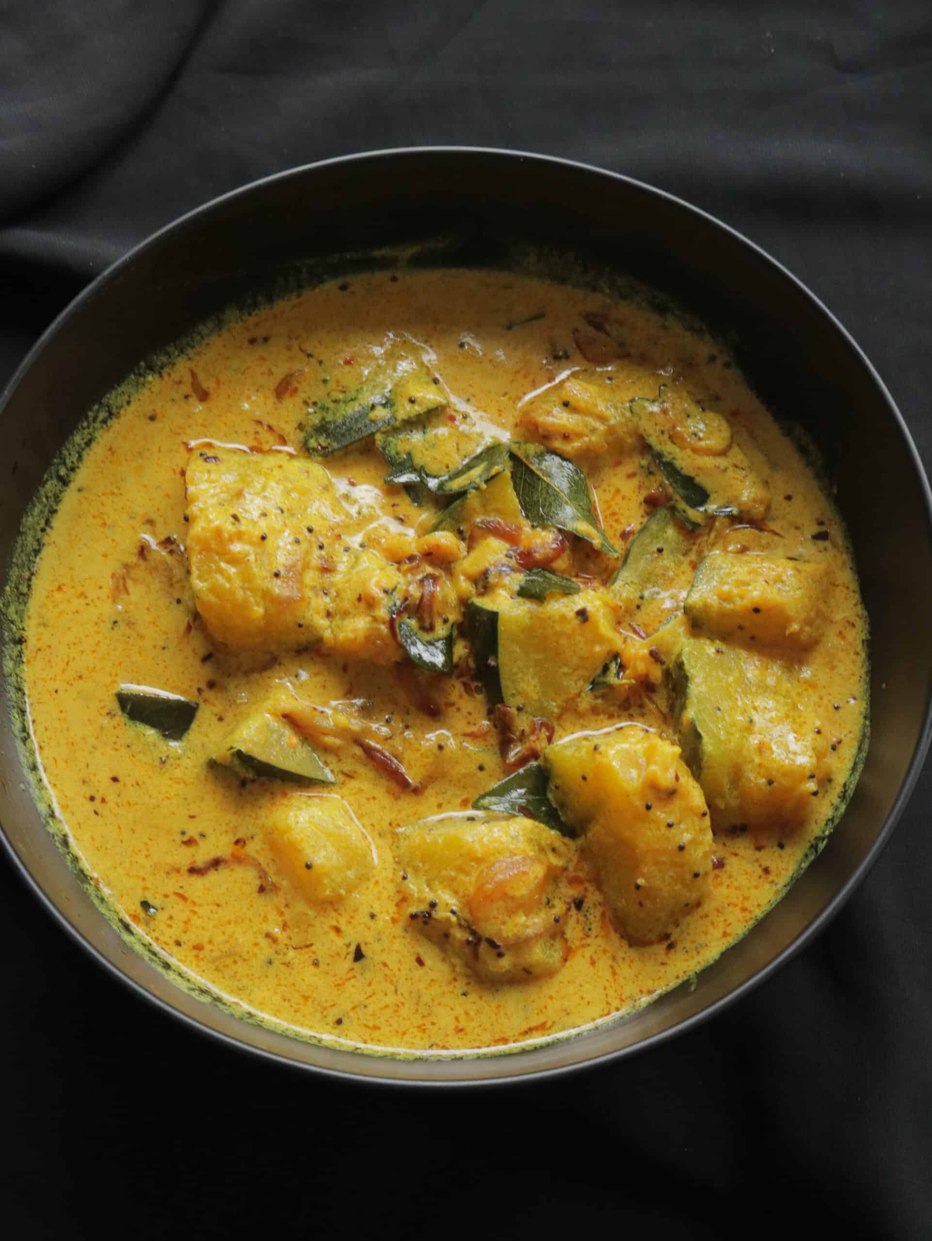 Sri Lankan creamy pumpkin curry. Sri Lankan pumpkin cooked in coconut milk and pieces of pumpkin cubes.