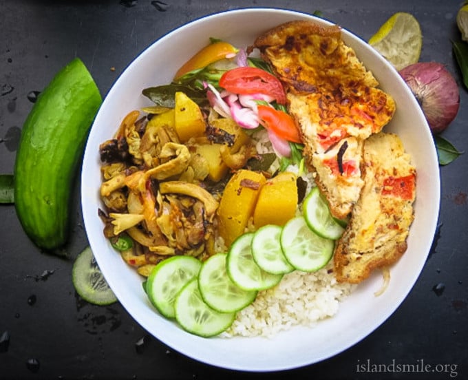 Rice, Cucumbers with Spring onion salad, Potatoes cooked in coconut milk. stir fried mushroomes and a spicy omelette makes perfect lunch.