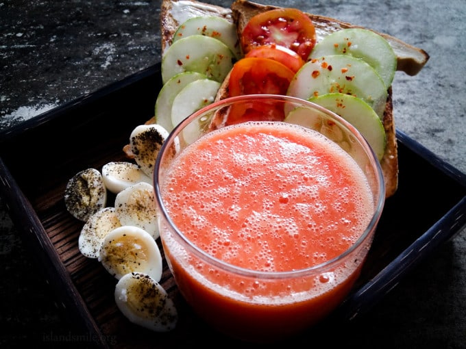 easy breakfast with quail eggs, tomatoes,cucumber topped cheesy toast with Papaya and Yoghurt Juice