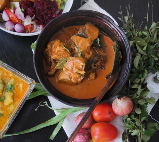 A Srilankan fish curry cooked in a rich, thick gravy made from Coconut milk infused with Tamarind juice. the spices balances the natural flavors, making it perfect for lunch with Rice or a light dinner with bread.-