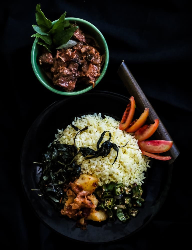 Monday theme meal No.12 with links to recipes showing you the steps to make a home cooked meal the Srilankan way. Ghee rice, Chicken curry, Stir fried Kankun, Spicy, dry Potato curry with fried Okra.