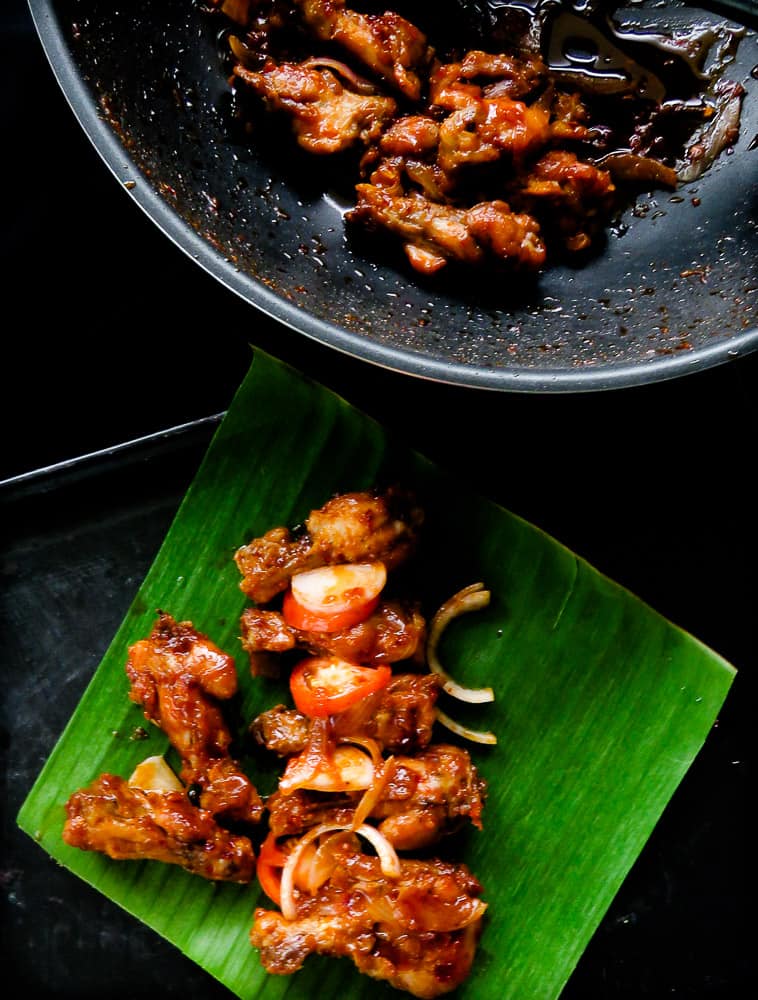 Pan-fried spicy chicken wings. Also known as Sri Lankan devil wings. It takes minutes to marinate and lock in flavors. A perfect appetizer in a rush that you could put together with a few ingredients. finger food for game nights, and parties.