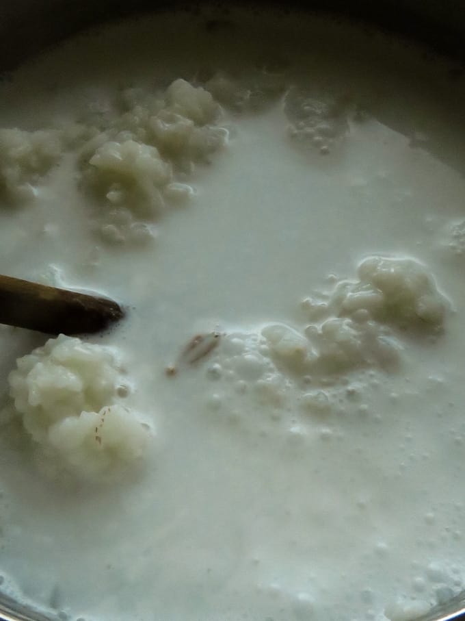 cooking the rice with coconut milk.