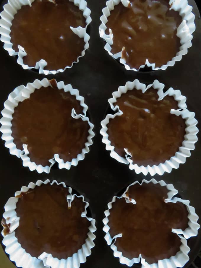 muffin mixed poured into cups.