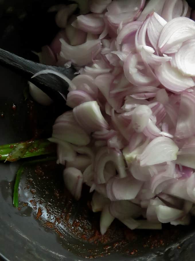 sliced onion mixed with spices to make the onion chutney/seeni sambol.