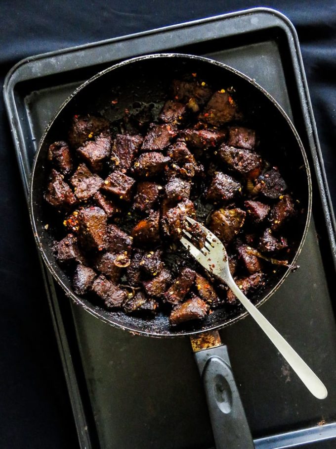 A Sri Lankan style black pepper fry. Have it with a plate of rice and curry, slice into smaller pieces they make the perfect filling for bread, buns, hot dogs, Tortillas anytime. Refrigerate it and the Beef can be used up to three weeks.