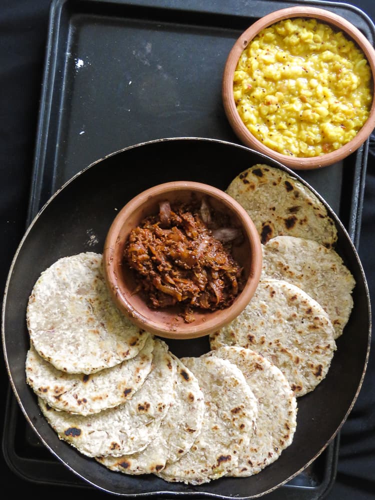 Sri Lankan Coconut roti(pol roti, flatbread). A rustic flatbread made up of flour, grated coconut with diced green chillies and Onions for extra texture. vegan, vegetarian, Sri Lankan breakfast-islandsmile.org