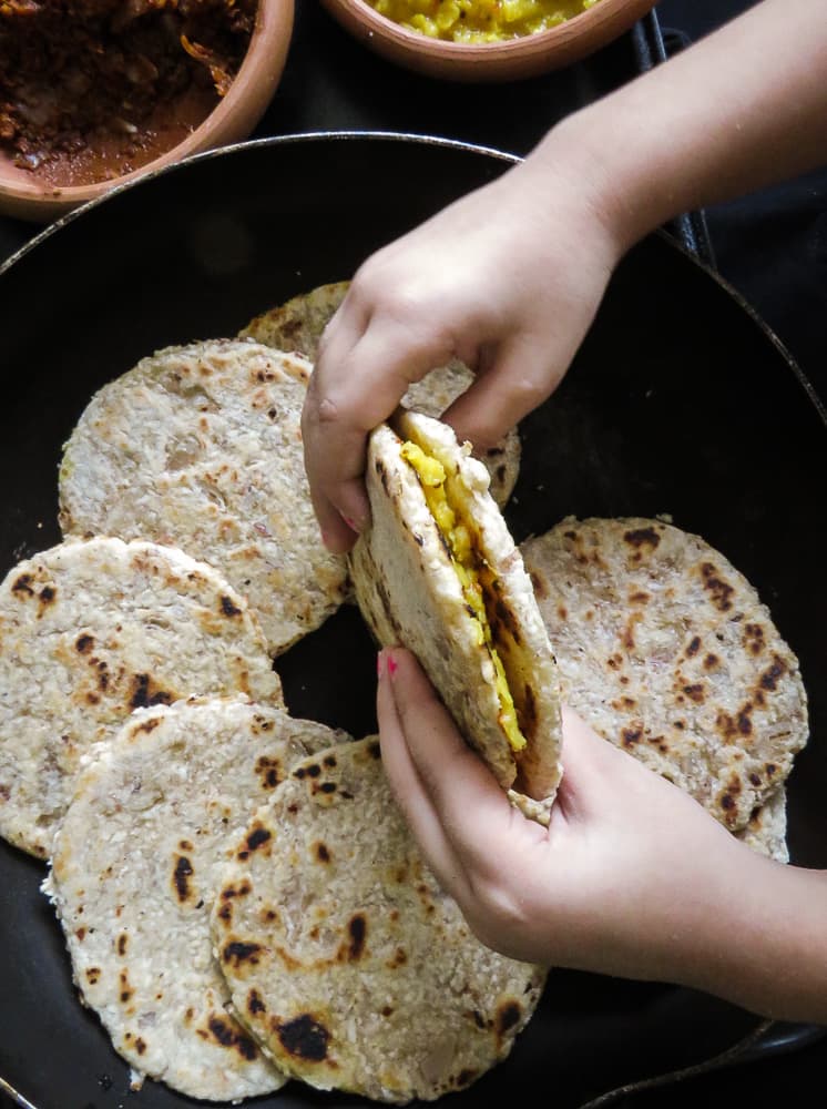 Sri Lankan Coconut roti(pol roti), roti sandwiched between dhal curry.