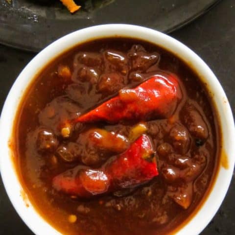 Barbecue sauce-Tamarind, red chillies, Garlic, makes this lip-smacking Barbecue sauce. It's hot, sweet with the right amount of sourness. Try this recipe at your next Barbecue or picnic. 