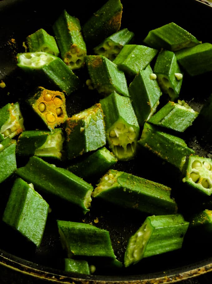 okra in turmeric powder.