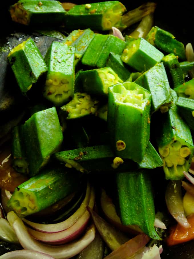 stir-frying the okra.