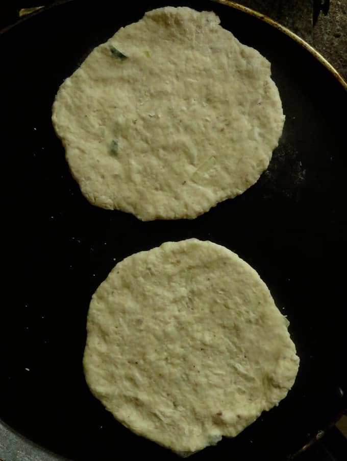 making the shapes for the coconut roti.