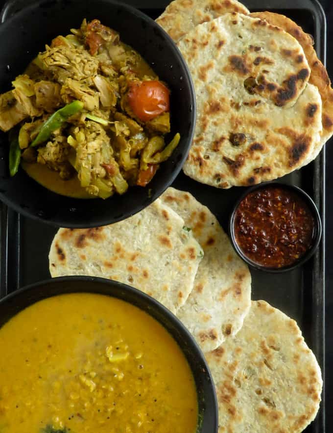 meal idea for pol roti. served with dhal curry, coconut roti, chilli paste and tuna curry.