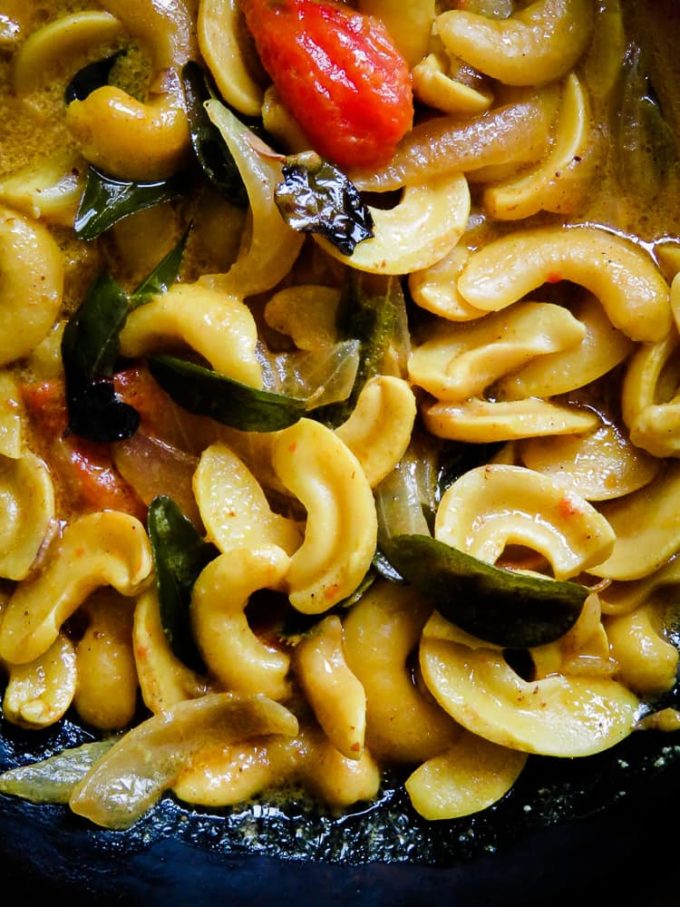Sri Lankan kaju curry(cashew curry). a vegan, vegetarian dish. Cooked in coconut milk and Sri Lankan spices, these kaju nuts take on extra creaminess. With the added soft crunch the whole flavor combination makes it a recipe worth trying.