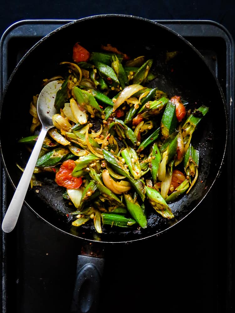 Sri Lankan Lady's fingers(okra) stir-fry, a vegan, vegetarian, green side-dish made in minutes. Try it, you might be surprised how good it tastes.-islandsmile.org