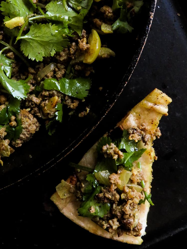 Beef keema curry, a skillet dish that makes meals easy. made with curried meat and extra garlic and coriander this Indian themed dish can be served with store-bought Pita or naan bread.