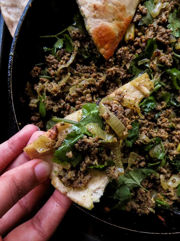 Beef keema curry, a skillet dish that makes meals easy. made with curried meat and extra garlic and coriander this Indian themed dish can be served with store-bought Pita or naan bread.