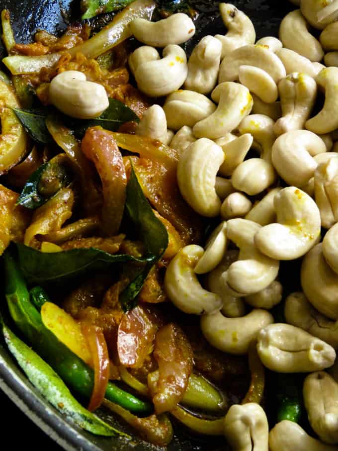 mixing tempering and cashews for the curry.