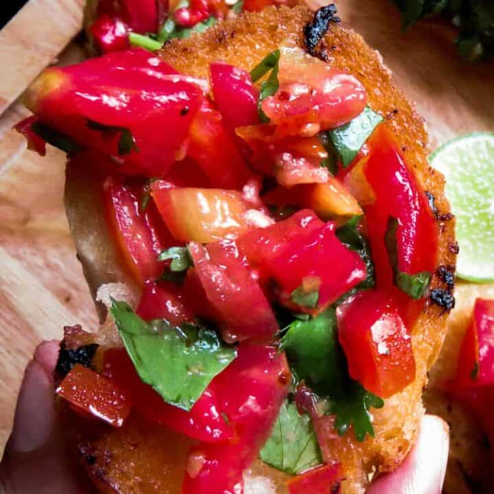 Spicy tomato-red chilli, coriander bruchetta