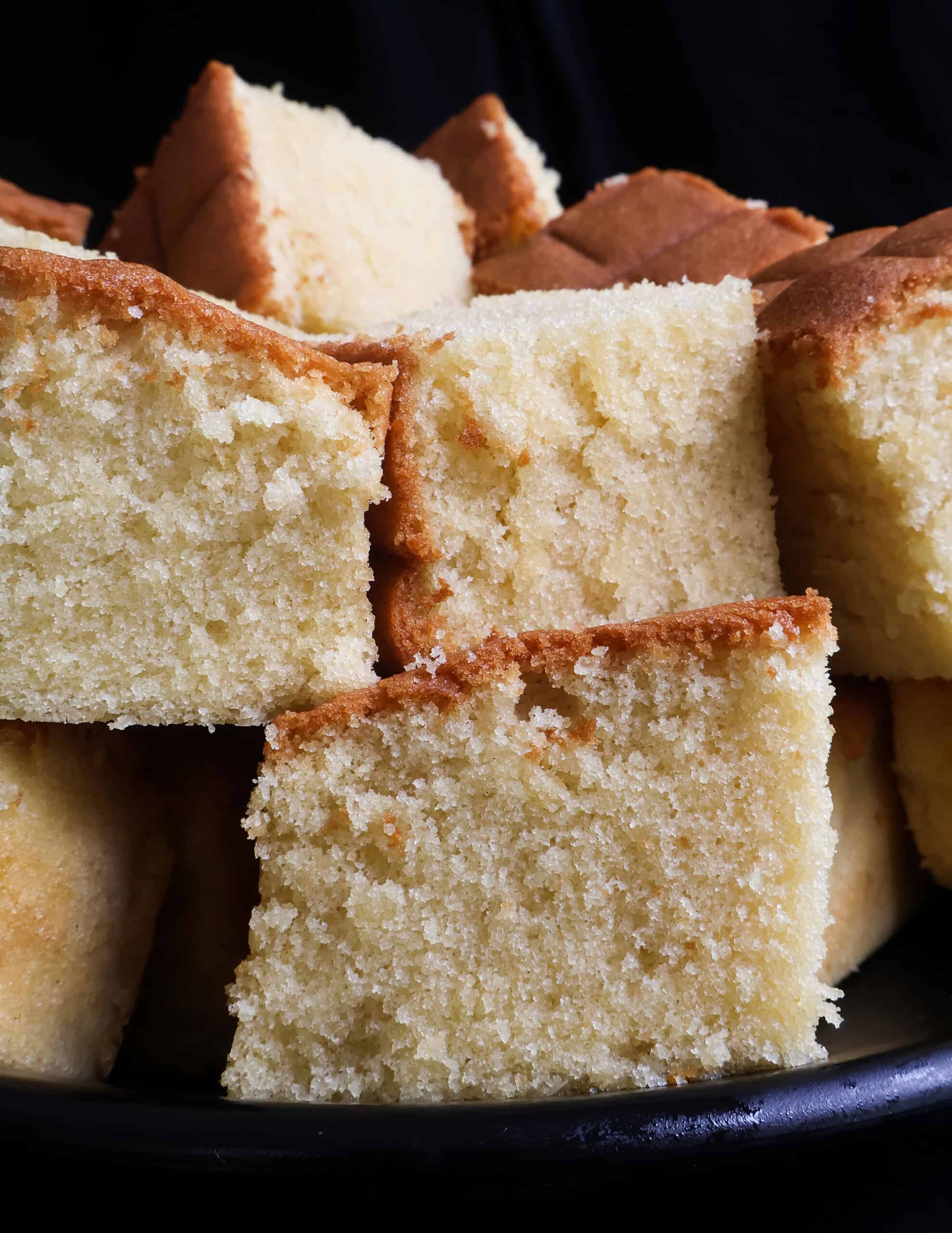 butter cake layered on a plate.