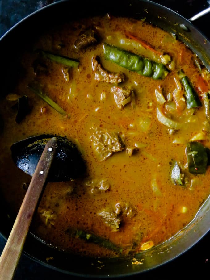 cooking with thin milk for the beef curry.