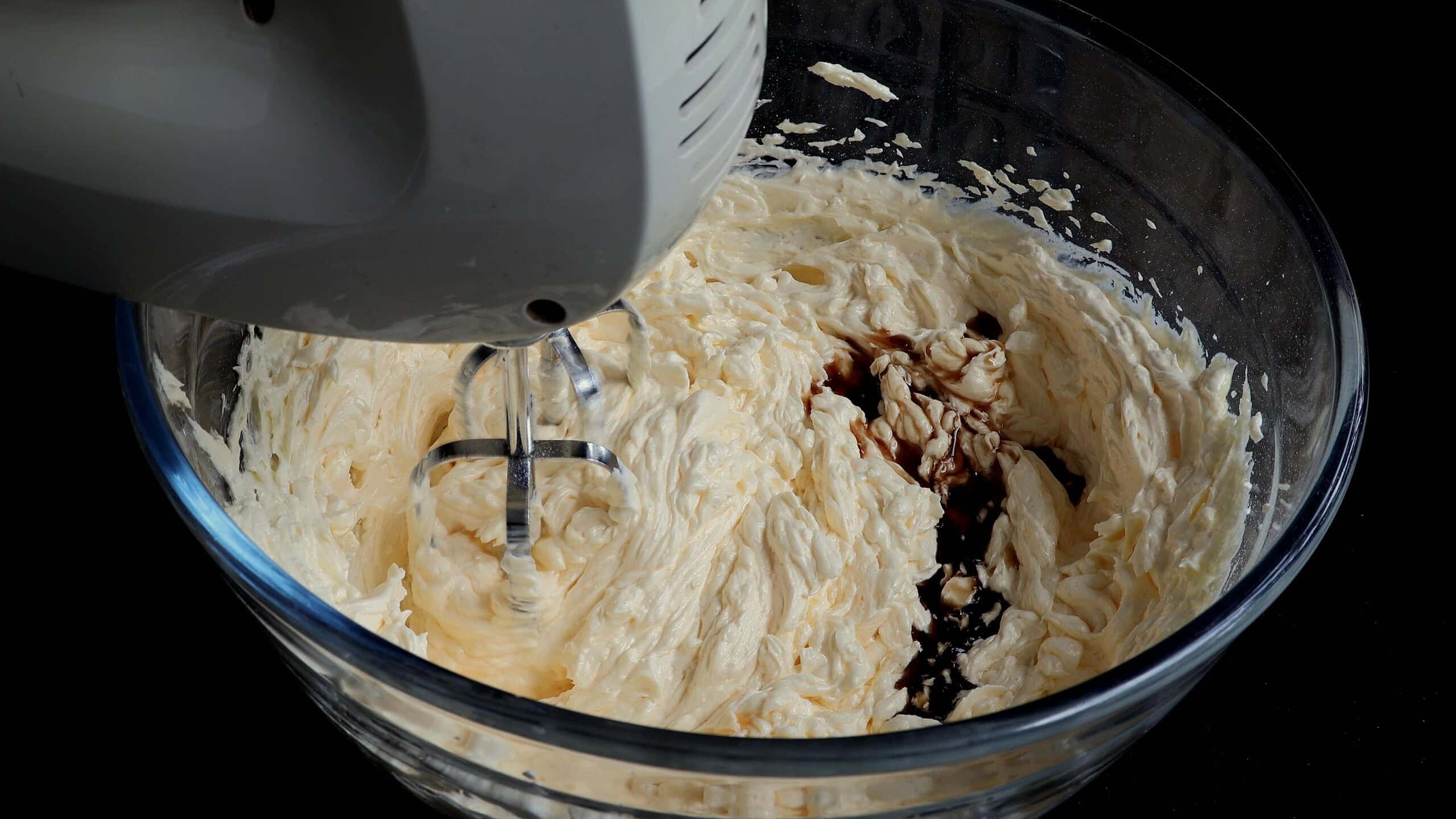 adding vanilla to the butter cake mixture.