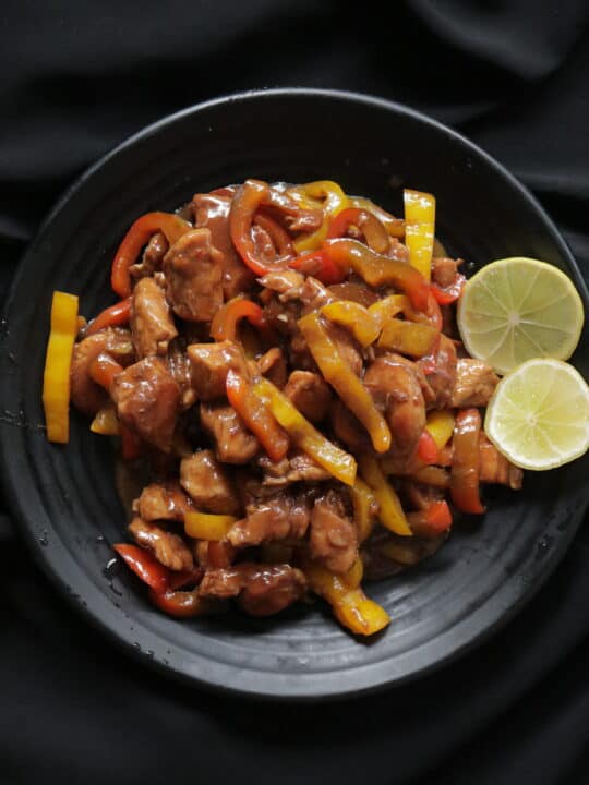 teriyaki chicken with onion and peppers. Add a few more of your favourite vegetables, give it a good toss, a bowl of rice on the side. your quick weekend meal is ready.