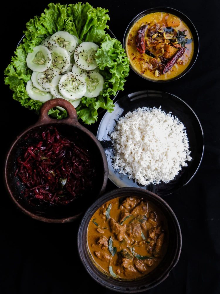 Sri Lankan Lunch meal plan 1- rice, mildly spiced beetroot curry, slow cooked beef made just like my grandmother used to make, pumpkin curry cooked in coconut milk, a few slices of Cucumber in a bed of salad leaves-islandsmile.org