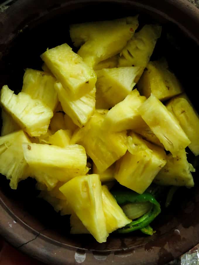Add the cubed pineapple to the tempering ingredients.