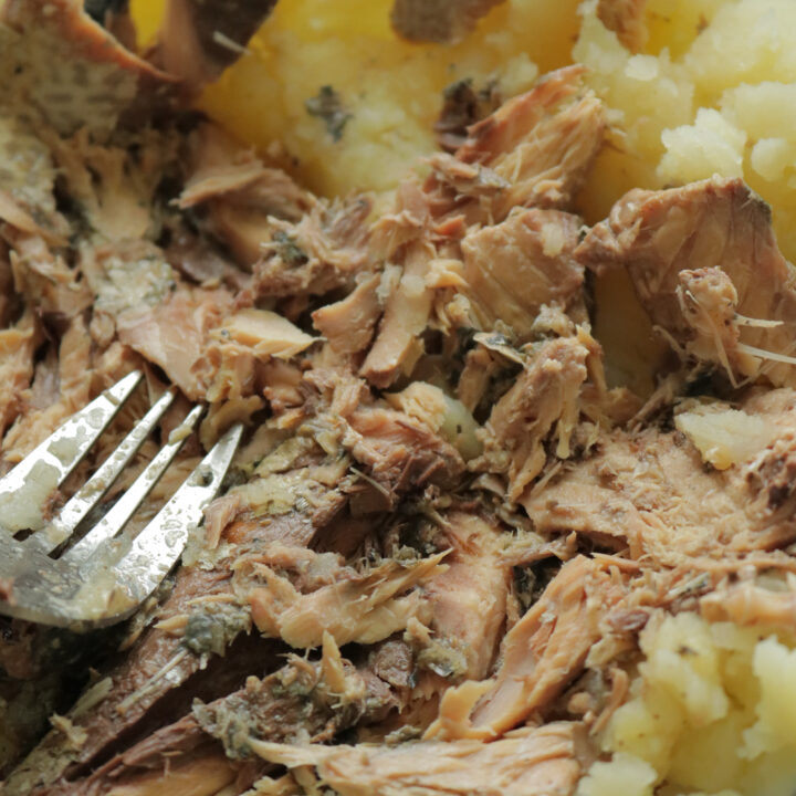 adding the canned fish into the boiled potatoes to make the fish cutlets.