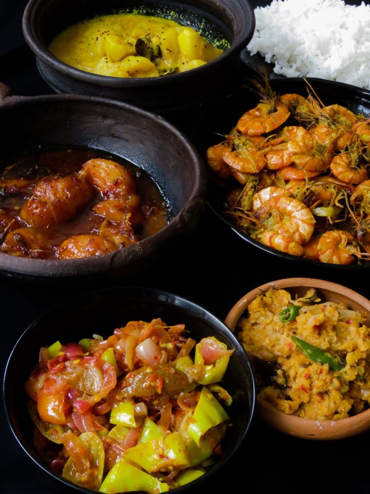 Sri Lankan meal plan 2- Rice with a prawn curry cooked in coconut milk, tempered-dry spicy dhal, capsicum with pickled lime sambol, a creamy potato milk curry and a sweet and spicy ambarella curry makes up this five-dish menu.-islandsmile.org Sri Lankan meal plan 2- Rice with a prawn curry cooked in coconut milk, tempered-dry spicy dhal, capsicum with pickled lime sambol, a creamy potato milk curry and a sweet and spicy ambarella curry makes up this five-dish menu.-islandsmile.org