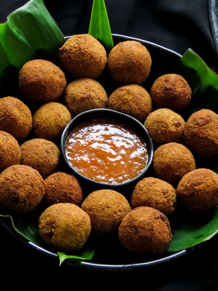 Deep-fried Sri Lankan fish cutlets, a spicy, savory bite served a sweet and spicy sauce.