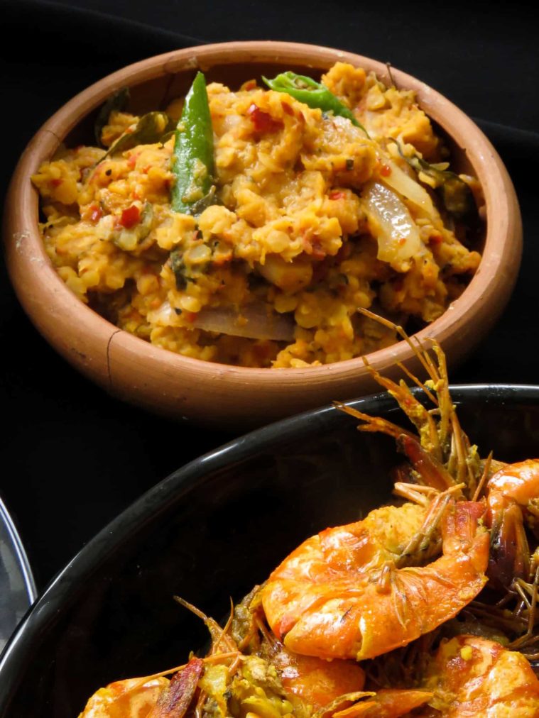 Sri Lankan meal plan 2- Rice with a prawn curry cooked in coconut milk, tempered-dry spicy dhal, capsicum with pickled lime sambol, a creamy potato milk curry and a sweet and spicy ambarella curry makes up this five-dish menu.-islandsmile.org Sri Lankan meal plan 2- Rice with a prawn curry cooked in coconut milk, tempered-dry spicy dhal, capsicum with pickled lime sambol, a creamy potato milk curry and a sweet and spicy ambarella curry makes up this five dish menu.-islandsmile.org