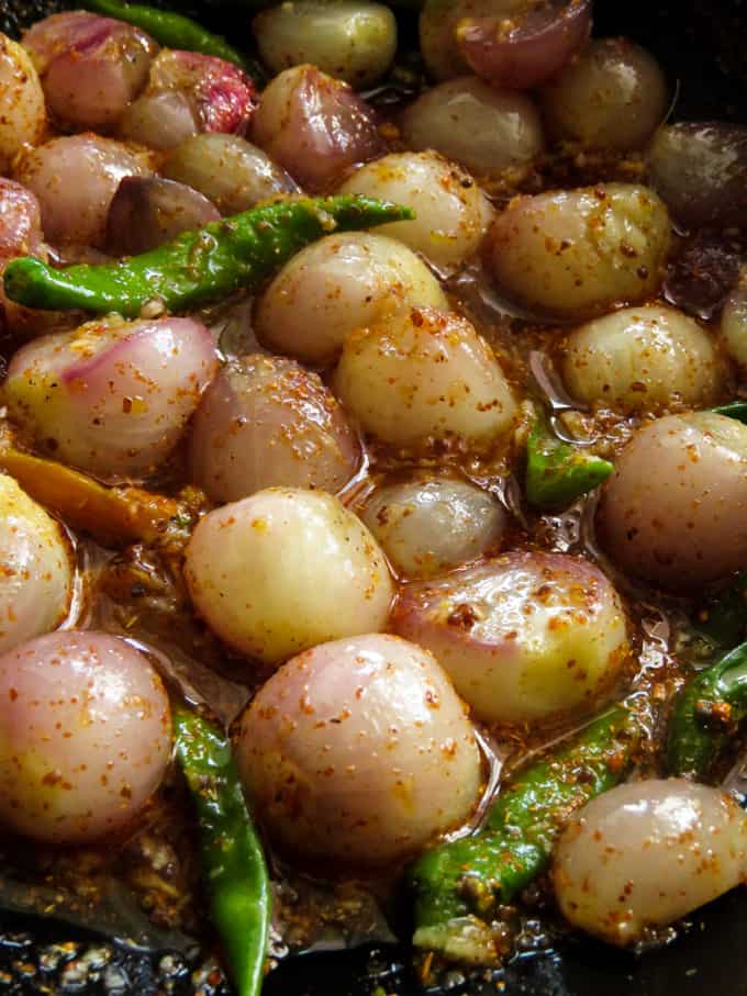 shallots and greenchillies soaking in pickling vinaigrette.