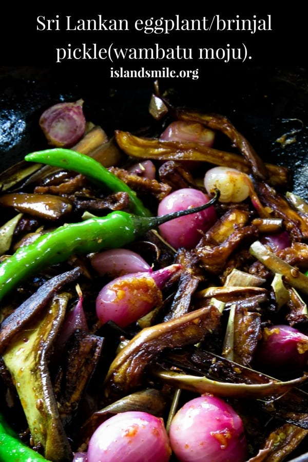 fried eggplant, shallots, green chillies soaked in a mustard pickle sauce.