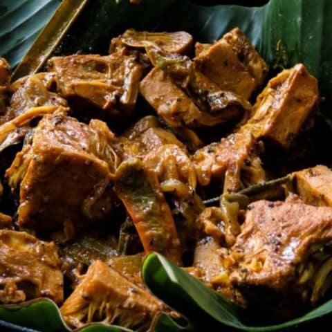Sri Lankan-vegan young/green jackfruit curry also known as Ambul Polos in Sinhalese. Enjoy a meatless meal just by adding polos curry to your menu. #greenjackfruit #babyjackfruit #vegan #vegetarian #glutenfree #slowcooked #srilankan #srialnkanfood
