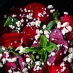 Raw beetroot-feta salad with pomegranate dressing- a beautiful salad, a pop of color on your table but also healthy and light. just 15-20 minutes from the time you peel, slice and assemble-islandsmile.org