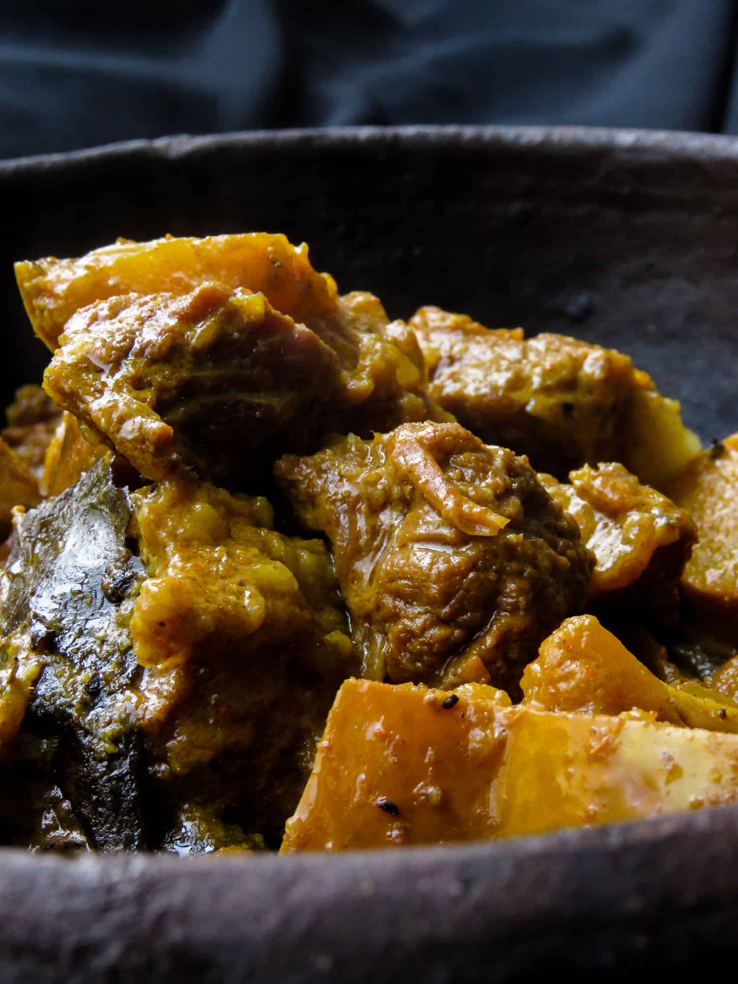 beef pumpkin curry with creamy and spicy flavours cooked a pan.