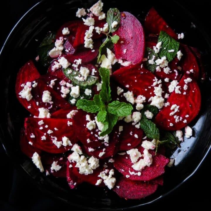 Raw beetroot-feta salad with pomegranate dressing- a beautiful salad, a pop of color on your table but also healthy and light. just 15-20 minutes from the time you peel, slice and assemble-islandsmile.org