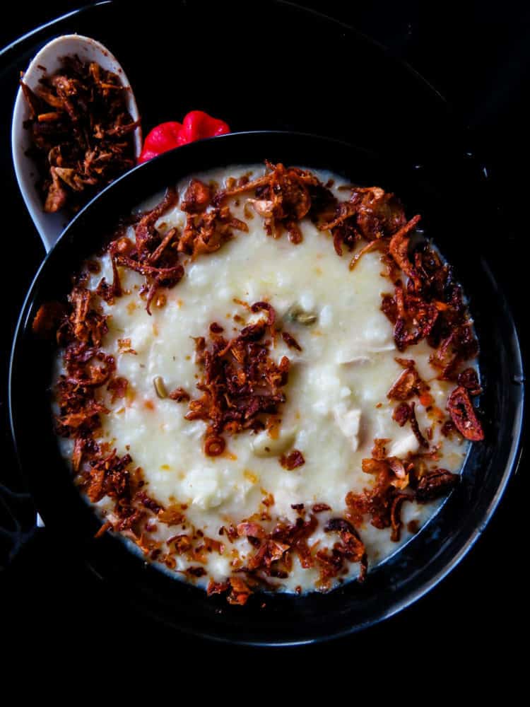 Sri Lankan rice and chicken congee- cooked in chicken broth, garlic and coconut milk, this kanji is a favorite among Muslims for iftar and a hearty morning breakfast for big families. serve with a seasoned, deep-fried crispy onion, garlic topping and enjoy-islandsmile.org