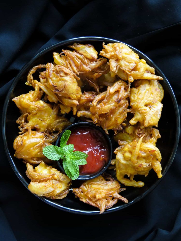 Crispy deep-fried onion fritters- light, crunchy and ideal for any time of the day, serve this savory bites as an appetizer or snack. all you have to do is mix the ingredients in a bowl and start deep-frying-islandsmile.org