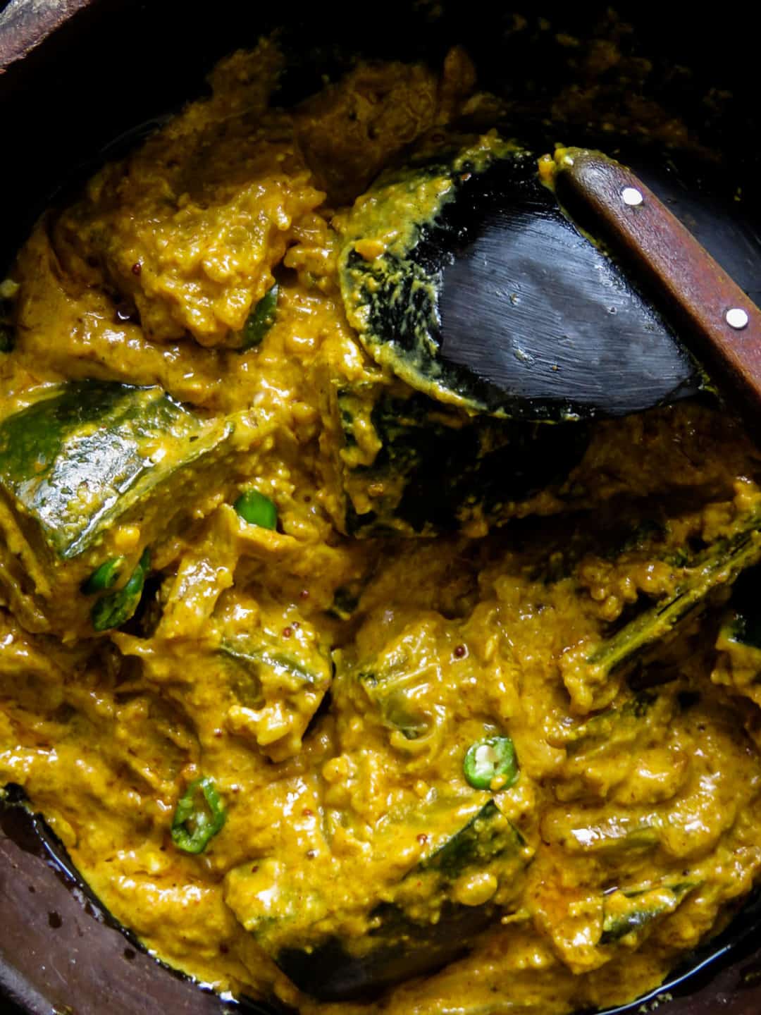 Sri Lankan pumpkin curry in roasted coconut also known as "kalu pol wattakka", a much more creamier, thicker pumpkin curry than what you'll be accustomed to, try it.