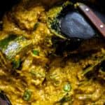 Sri Lankan pumpkin curry in roasted coconut also known as "kalu pol wattakka", a much more creamier, thicker pumpkin curry than what you'll be accustomed to, try it.