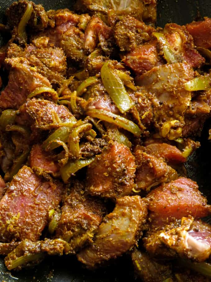 beef combined with the spice paste for the indian beef and potato curry.