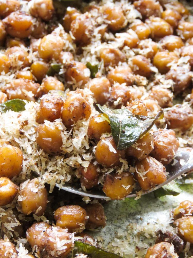healthy oven-roasted curry chickpeas can be a snack, breakfast or topped over a simple meal. add a pinch of homemade garam masala to give these easy chickpeas a curry flavor you'll enjoy.