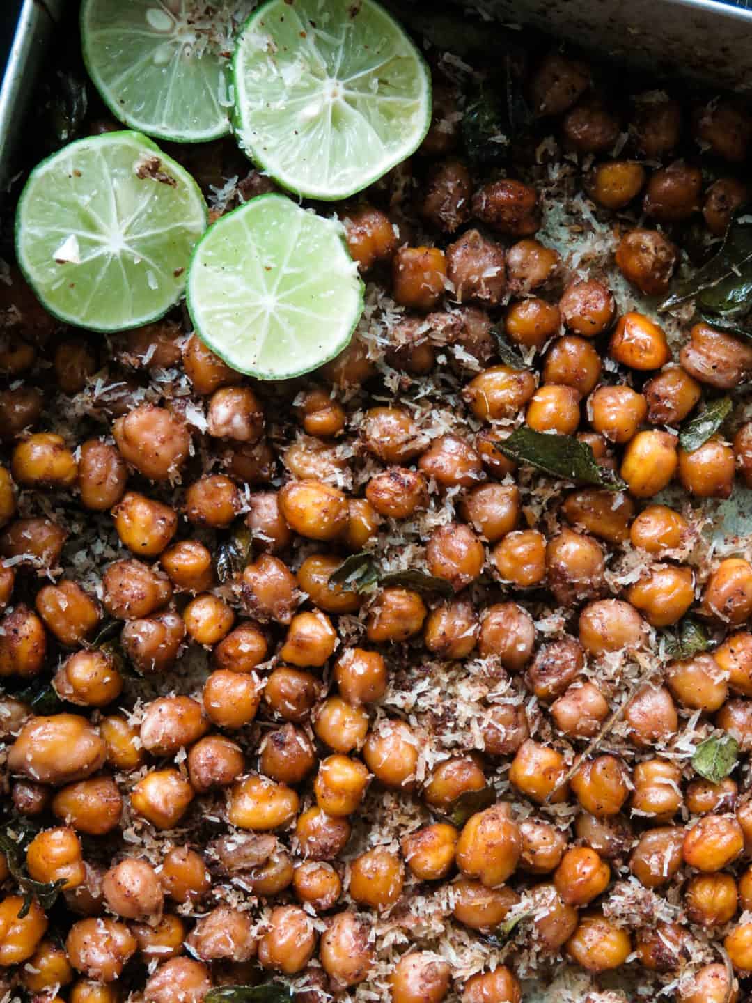 Healthy oven-roasted curry chickpeas with coconut flakes - breakfast, snack or as a simple topping for a bowl meal you'll find these chickpeas with a pinch of garam masala is a good vegan, vegetarian recipe.